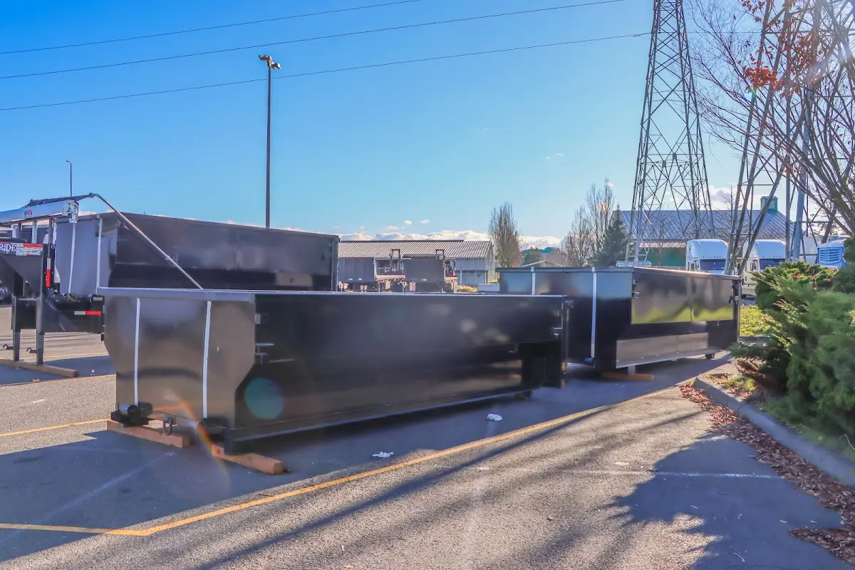 Roll-off dumpster ready for waste disposal at job site for Concrete Dumpster Rental in Lehman